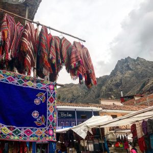 Clothing for sale in the market in Pisac, Peru