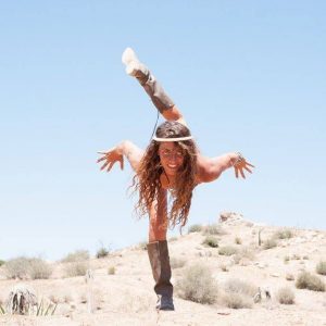 Adrianna Peters, Yoga Teacher Training Facilitator posing