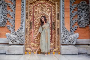 Lacey Krishna in front of door