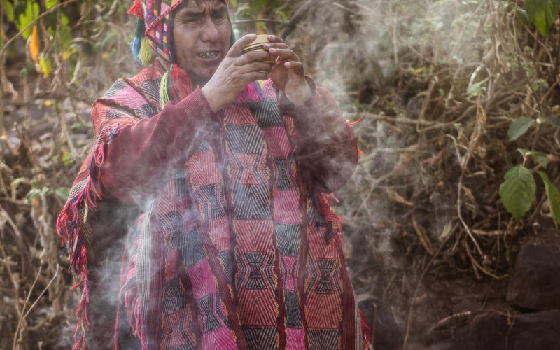 Shaman healing at yoga retreat in Sacred Valley, Peru