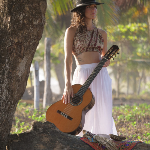 Sam Bianchini Standing with guitar